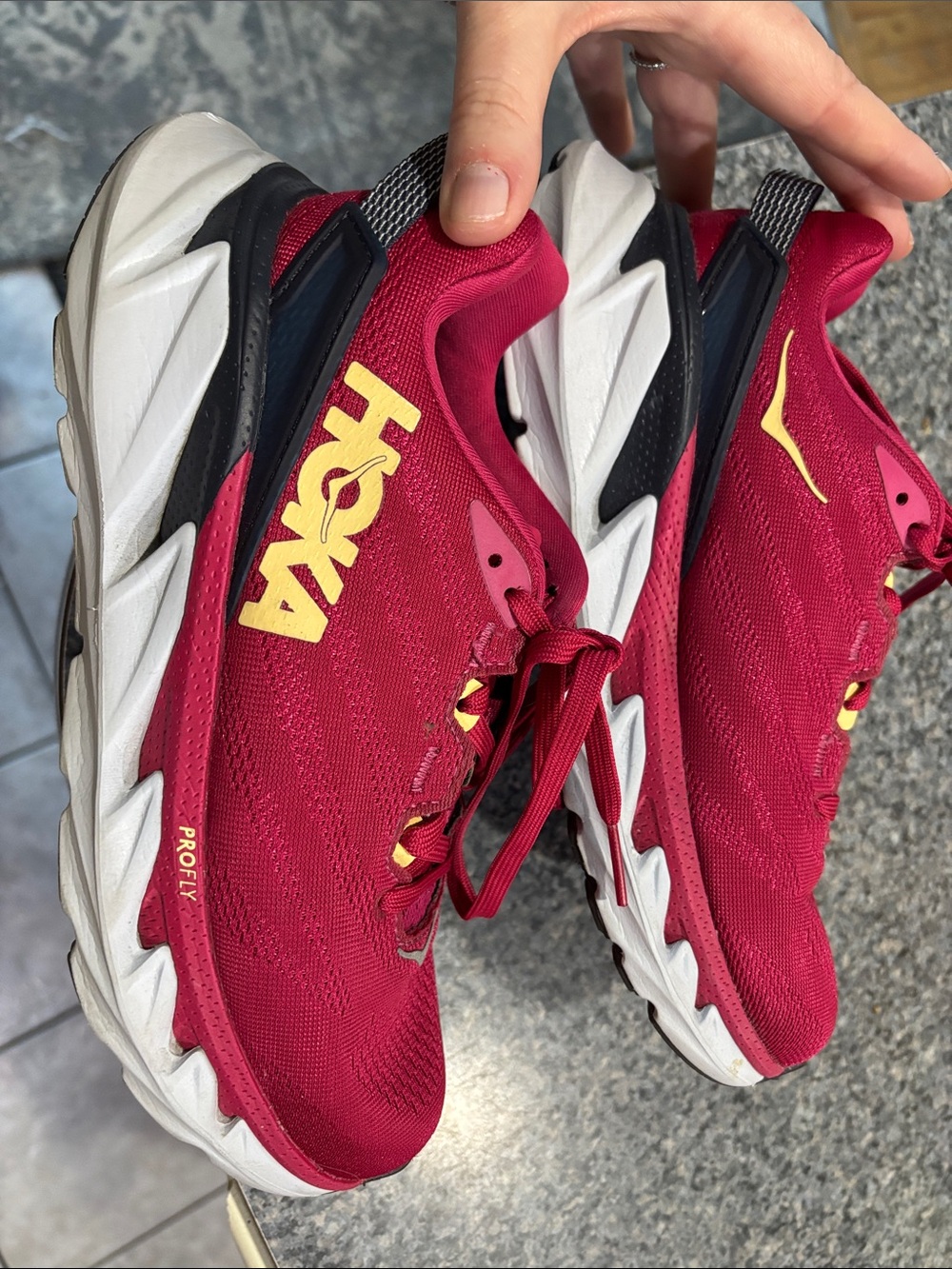 Hoka Running Shoes in Red with Yellow Accents